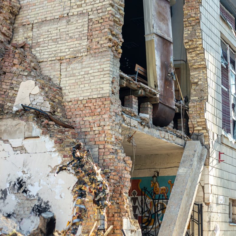 War in Ukraine. Stop the war. Ruins of a house where a rocket hit. High quality photo. Bombed house. Ruins.